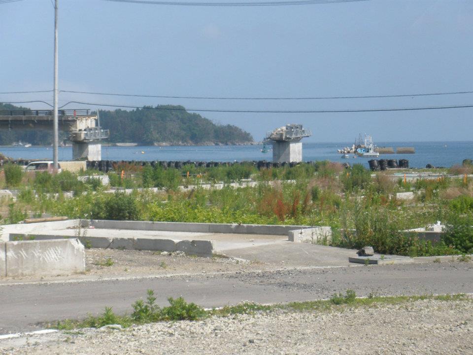 Only the foundation of this building was left. In the back, you can see an elevated road that was wiped out.